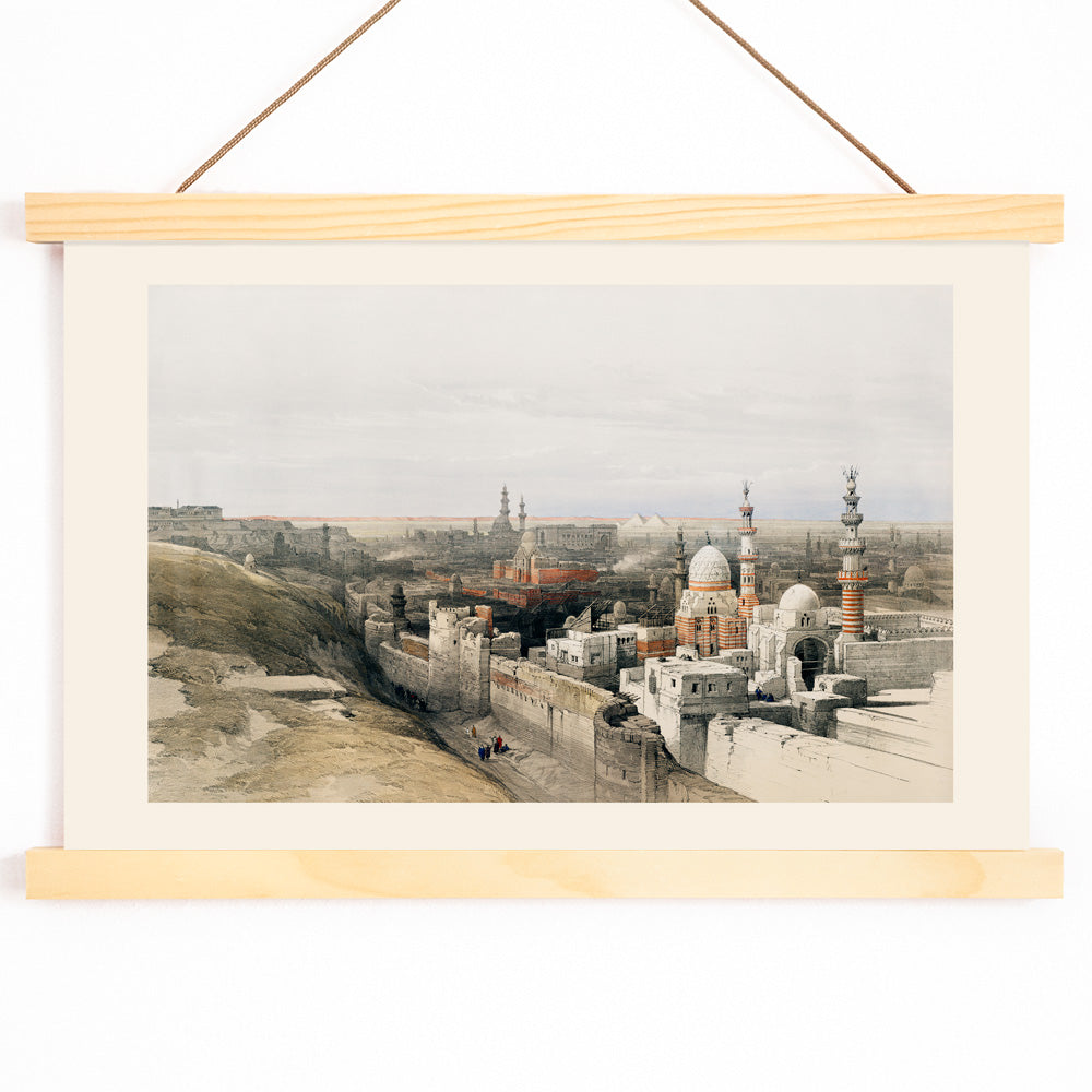 Panoramic cityscape of Cairo with mosques historic architecture and city walls looking west artwork by David Roberts, with wooden magnetic frame on white background