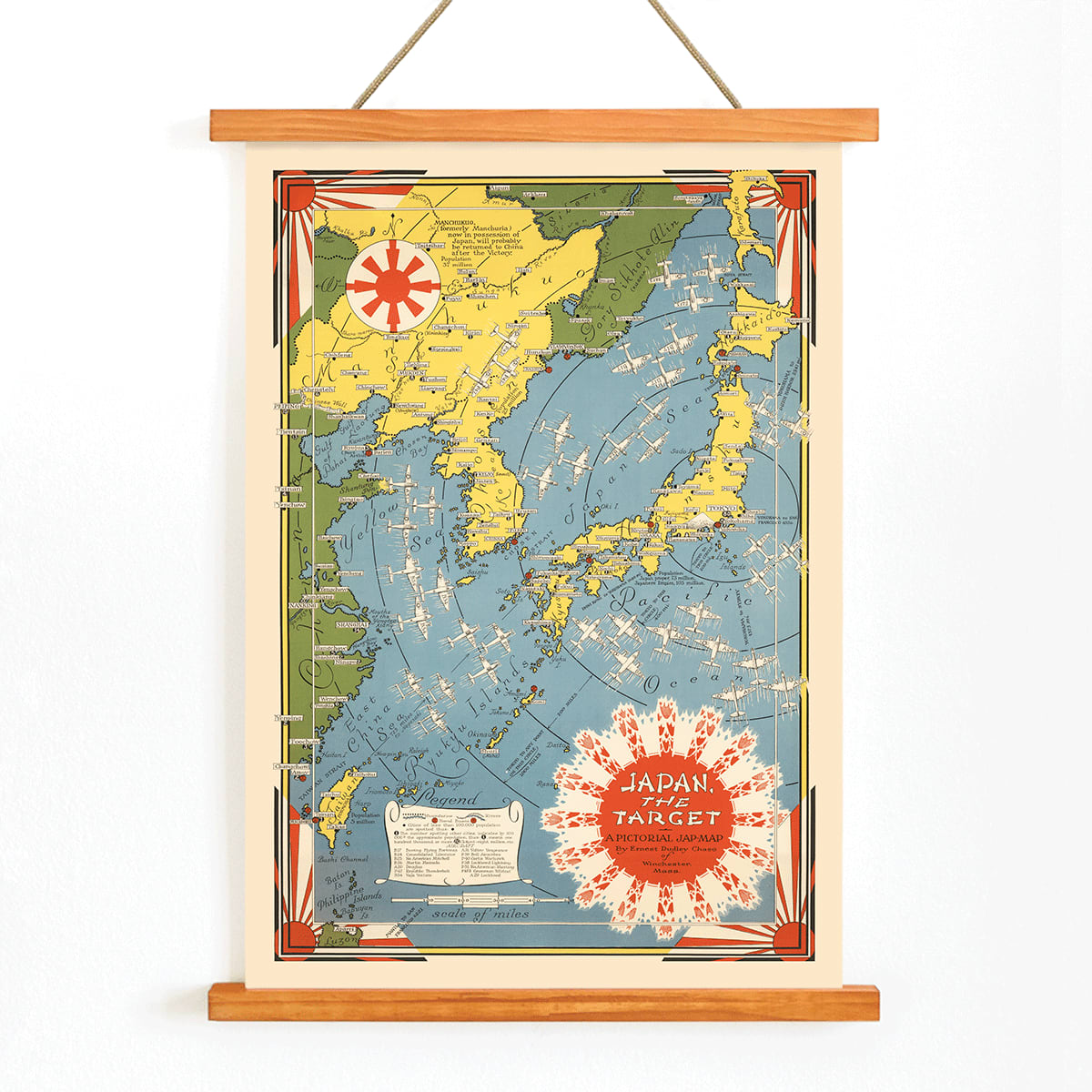 Colorful illustrated map of Japan and surrounding regions by Ernest Dudley Chase titled Japan the Target a Pictorial Jap-map poster, with wooden magnetic frame on white background