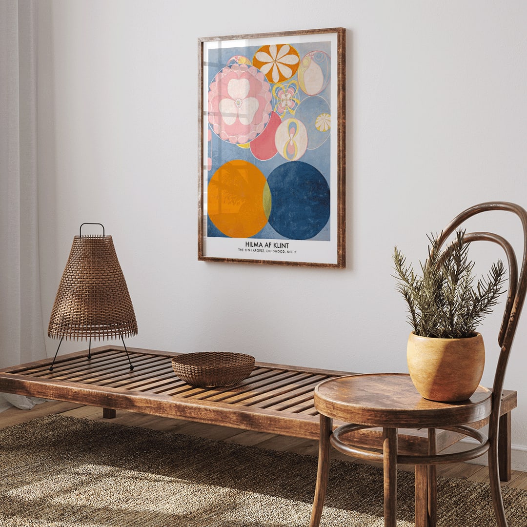 Colorful abstract circles and floral patterns from The Ten Largest Childhood series by Hilma AF Klint, framed and displayed in home decor