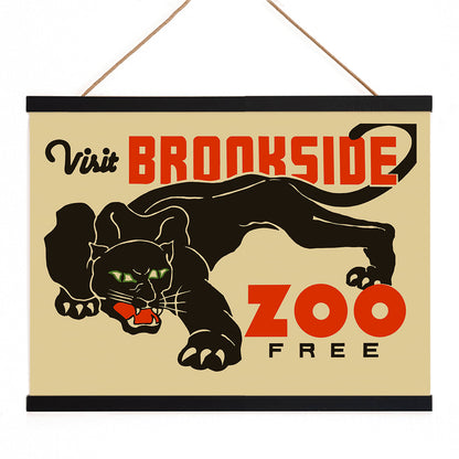 Visit Brookside Zoo poster featuring a black leopard illustration by Carken with the text Visit Brookside Zoo Free, with wooden magnetic frame on white background