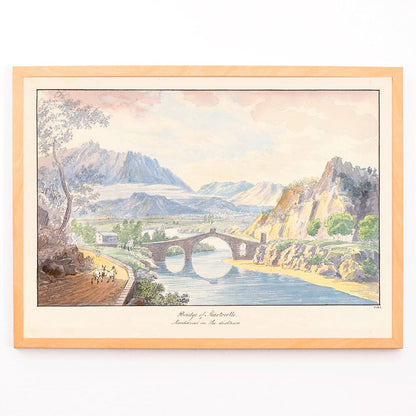 Bridge of Martorelle by Charles Hamilton Smith stone bridge over river with mountains scenic landscape poster, framed and displayed in modern living room decor