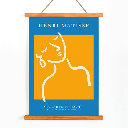 Henri Matisse poster of abstract girl with earring in orange and blue from Galerie Maeght artwork, with wooden magnetic frame on white background