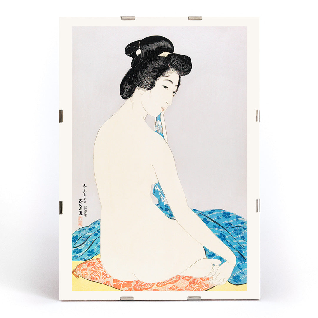 Japanese woman sitting with towel and nude woman on colorful fabrics in Woman After a Bath by Goyo Hashiguchi poster, framed and displayed in modern living room decor