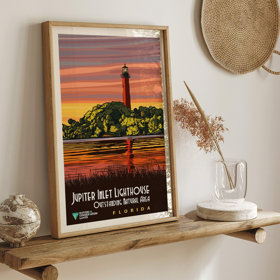 Jupiter Inlet Lighthouse Outstanding Natural Area in Florida artwork and poster with sunset reflection on water and trees, framed and displayed in home decor
