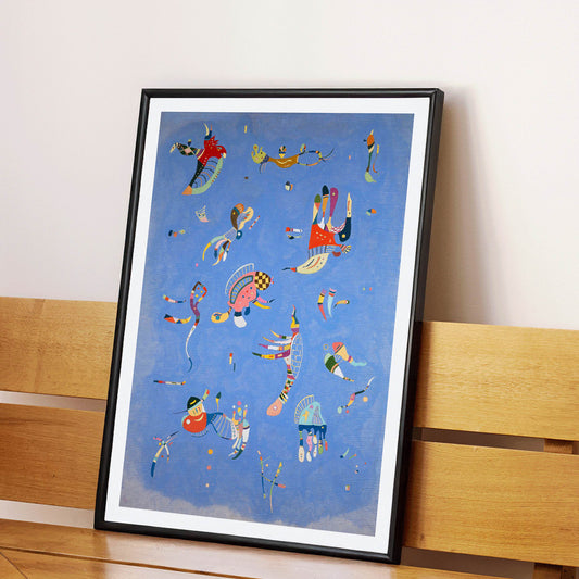 Bleu de Ciel by Wassily Kandinsky abstract blue artwork poster with colorful geometric shapes and vibrant colors on a blue background, framed and displayed in home decor