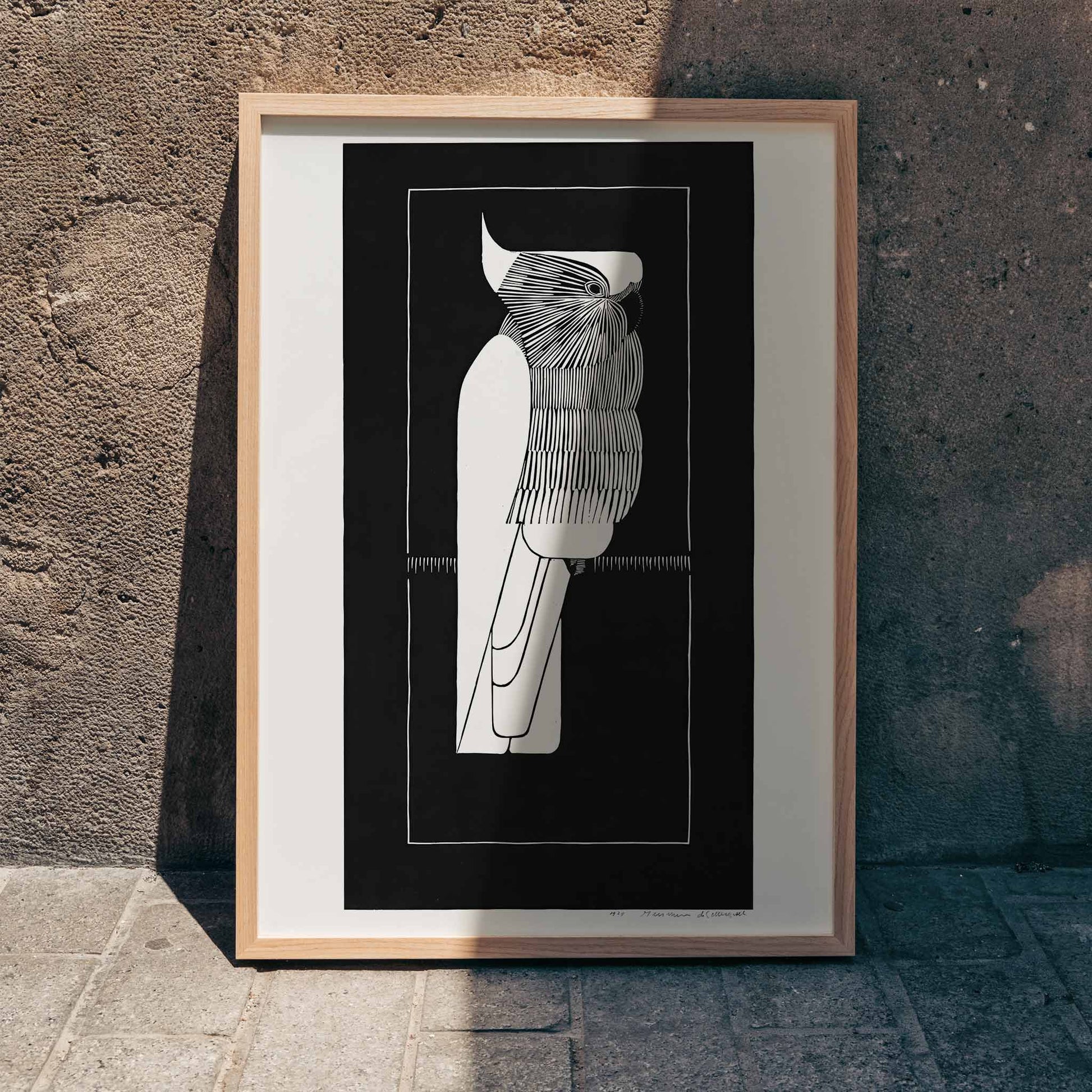 Black and white sulphur crested cockatoo fine art print and stylized poster by Samuel Jessurun de Mesquita, framed and displayed in home decor