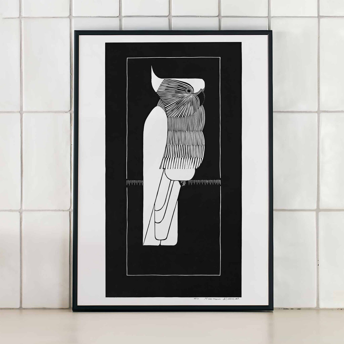 Black and white sulphur crested cockatoo fine art print and stylized poster by Samuel Jessurun de Mesquita, framed and displayed in modern living room decor
