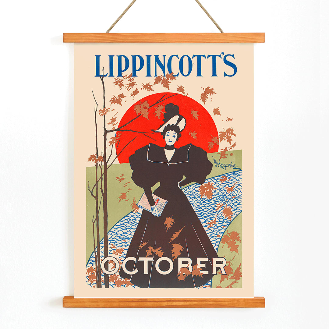 Lippincotts October poster by William Carqueville featuring an elegant woman in a black dress holding a book with autumn leaves, with wooden magnetic frame on white background