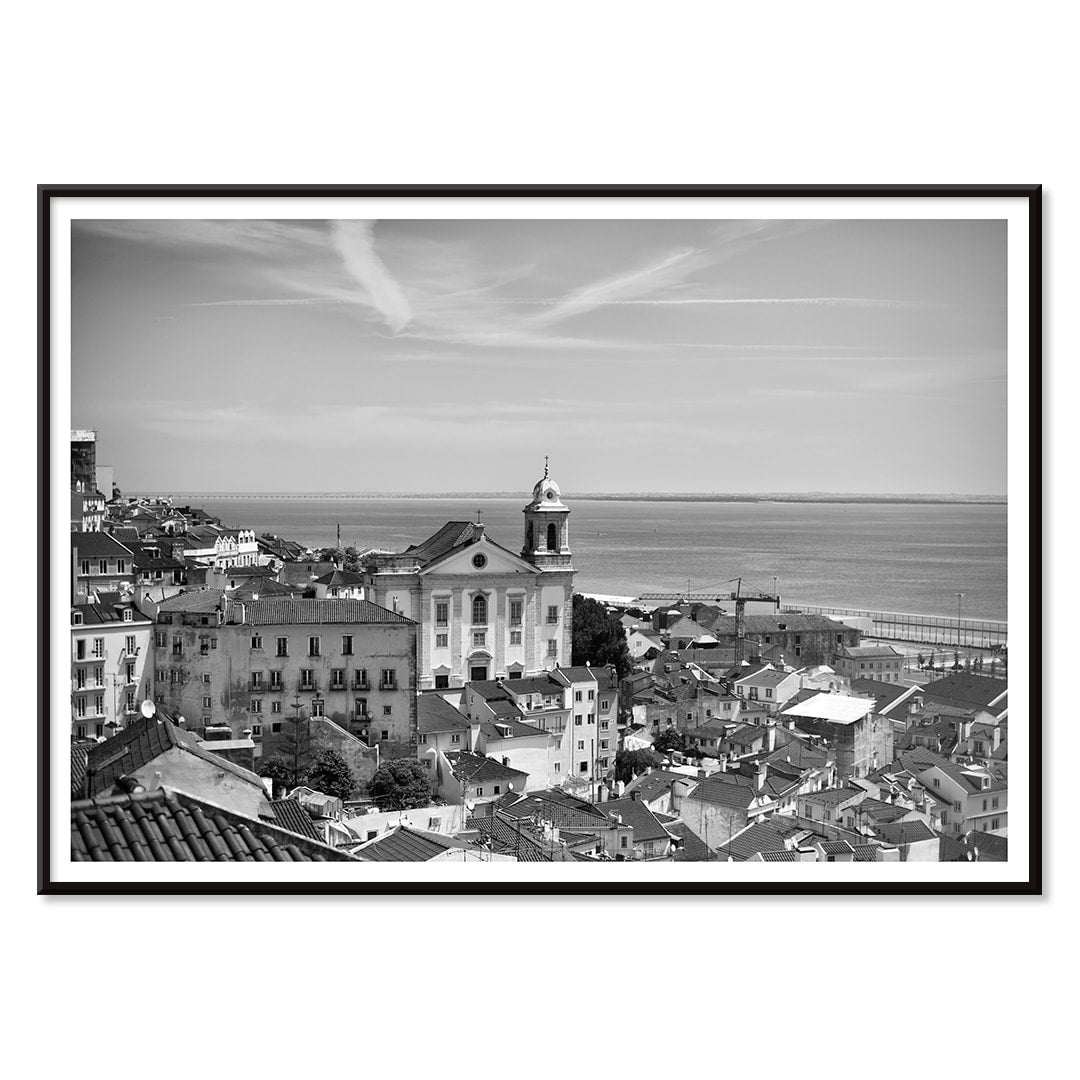 Lisbon Old City Landscape Black and White Picture 1 showing historic buildings rooftops and ocean view waterfront poster, with black aluminium frame on white background