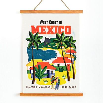 Colorful vintage travel poster of the West Coast of Mexico by Ray Bethers with palm trees and vibrant colorful houses, with wooden magnetic frame on white background