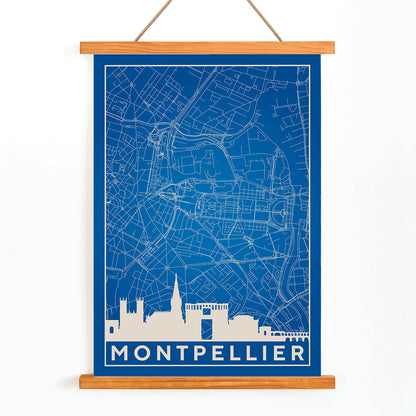 Minimalist map art print and detailed blue and white poster of Montpellier with city landmarks by Minimalist Montpellier Map, with wooden magnetic frame on white background