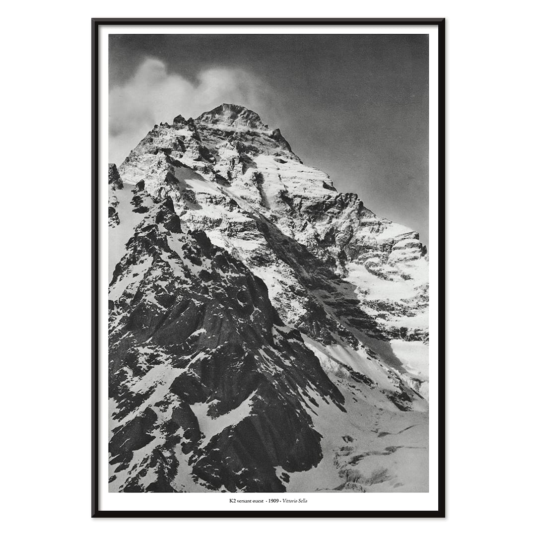 Black and white photograph and poster of K2 west face by Vittorio Sella showing the snow-covered mountain peak, with black aluminium frame on white background