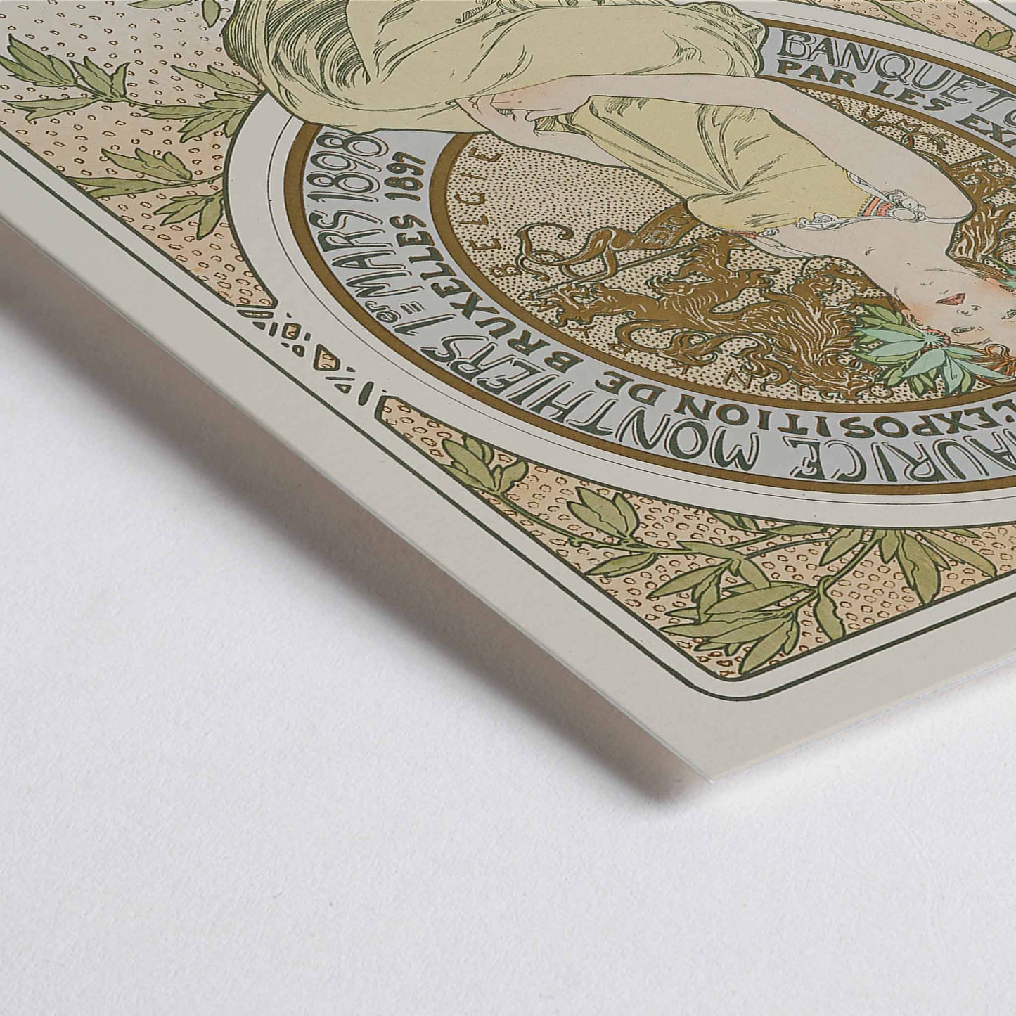 Closeup detail of Alphonse Mucha Exposition de Bruxelles Art Nouveau poster with graceful woman and floral ornaments in soft green and beige tones