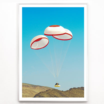 Closeup detail of CST-100 crew capsule landing with three parachutes over desert landscape by NASA and The Boeing Company poster artwork
