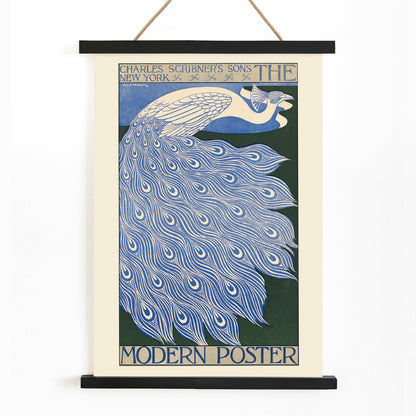 Elegant blue and white peacock with flowing feathers illustration from The Modern Poster by Will Bradley, with wooden magnetic frame on white background