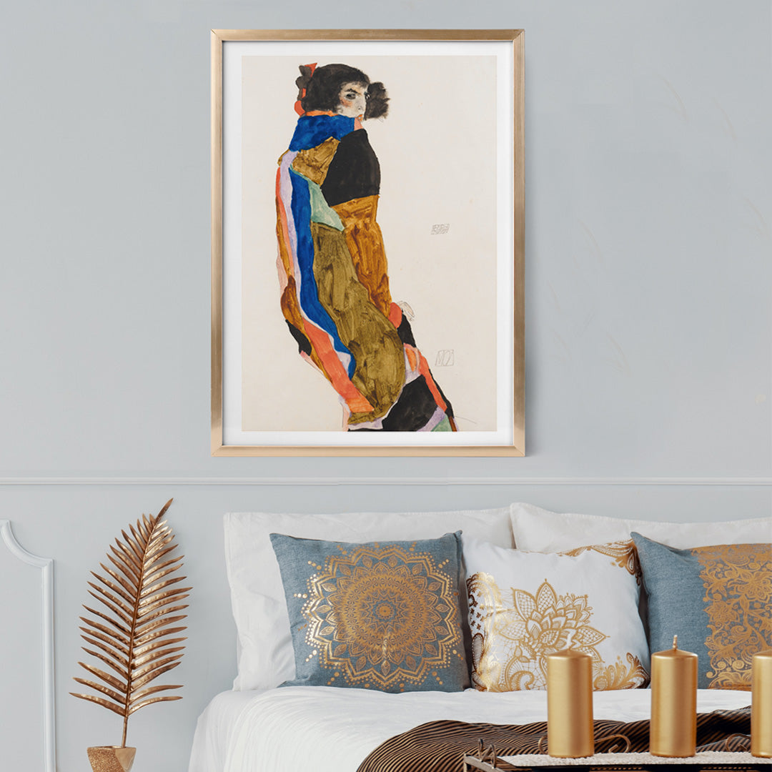 Colorful portrait poster of a woman in a patterned robe looking back Moa by Egon Schiele expressive art print, framed and displayed in home decor