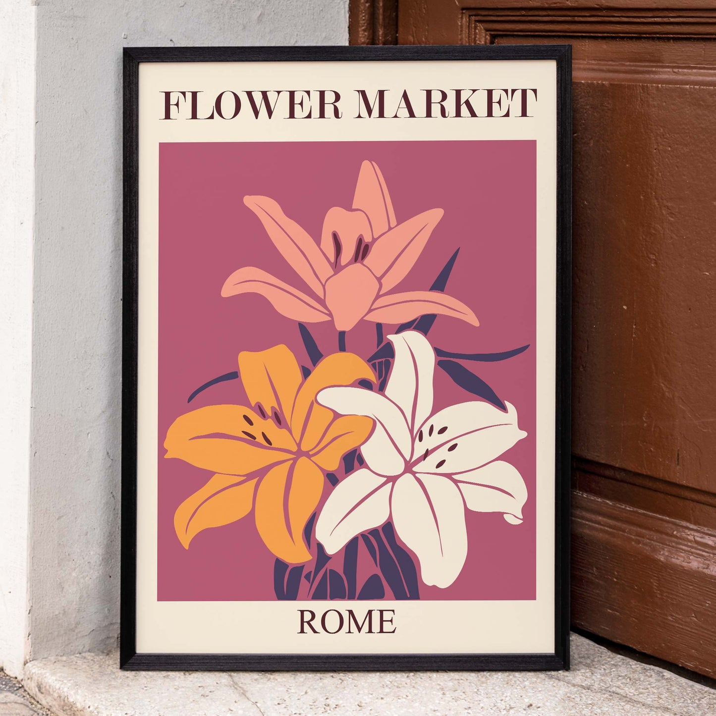 Colorful floral illustration poster of vibrant lilies with text Flower Market Rome by Moryarty on maroon background, framed and displayed in home decor