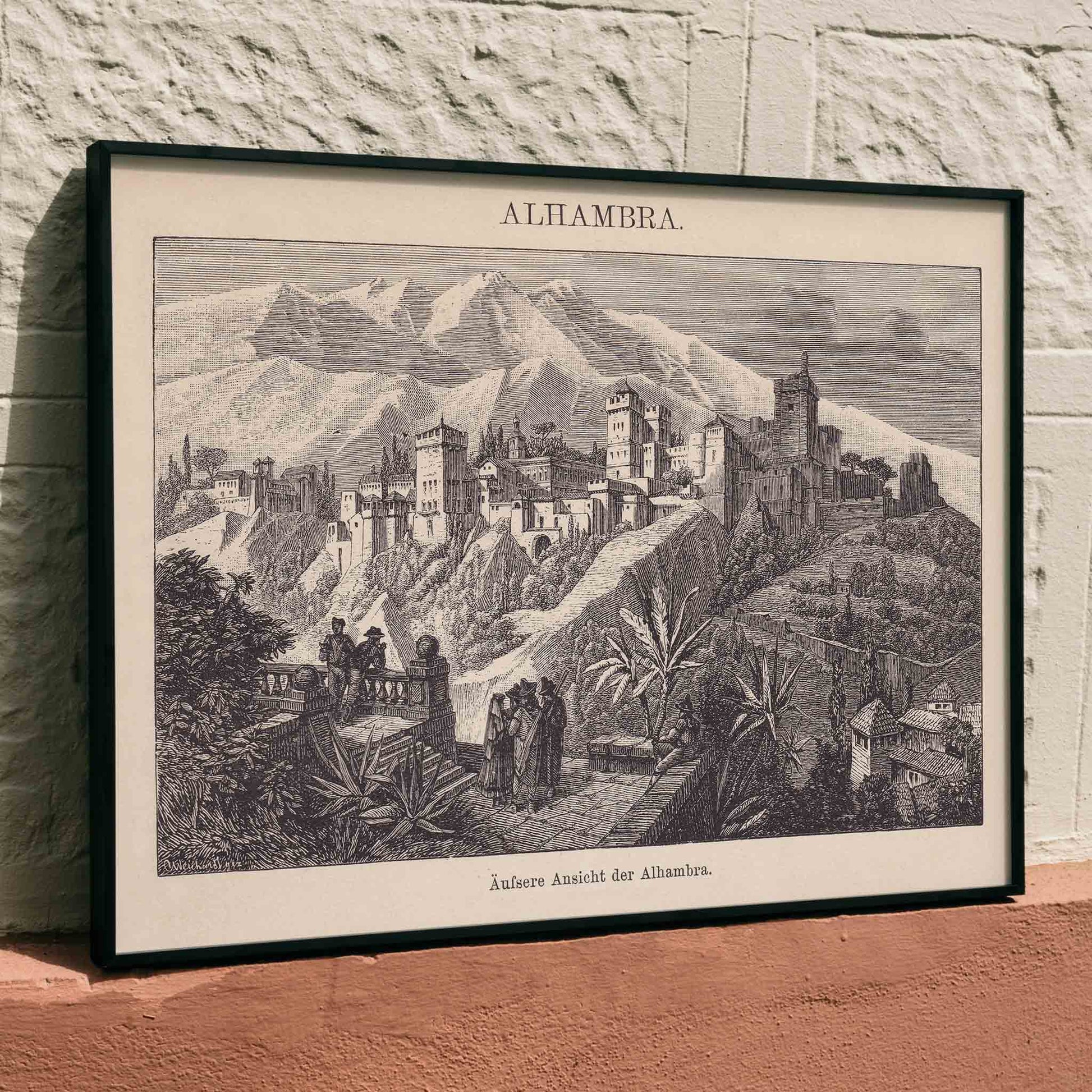 Vintage illustration poster of Alhambra palace with mountains and vegetation by The Institute of Liepzig, framed and displayed in home decor