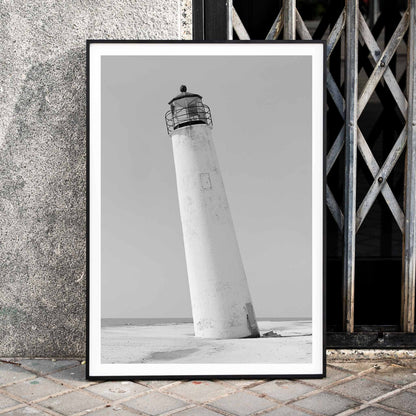 Cape Saint George Lighthouse poster featuring a tilted lighthouse on a sandy beach in Apalachicola Franklin County Florida, framed and displayed in home decor