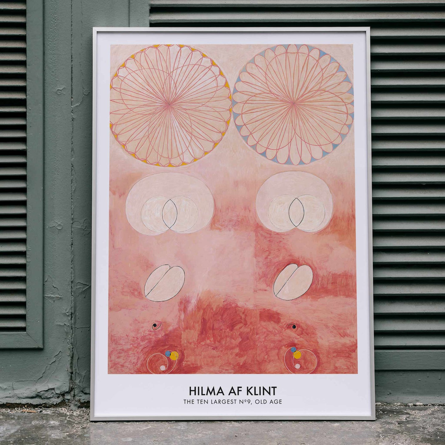 Abstract geometric and circular patterns in pink and orange from The Ten Largest Old Age by Hilma af Klint art poster, framed and displayed in home decor