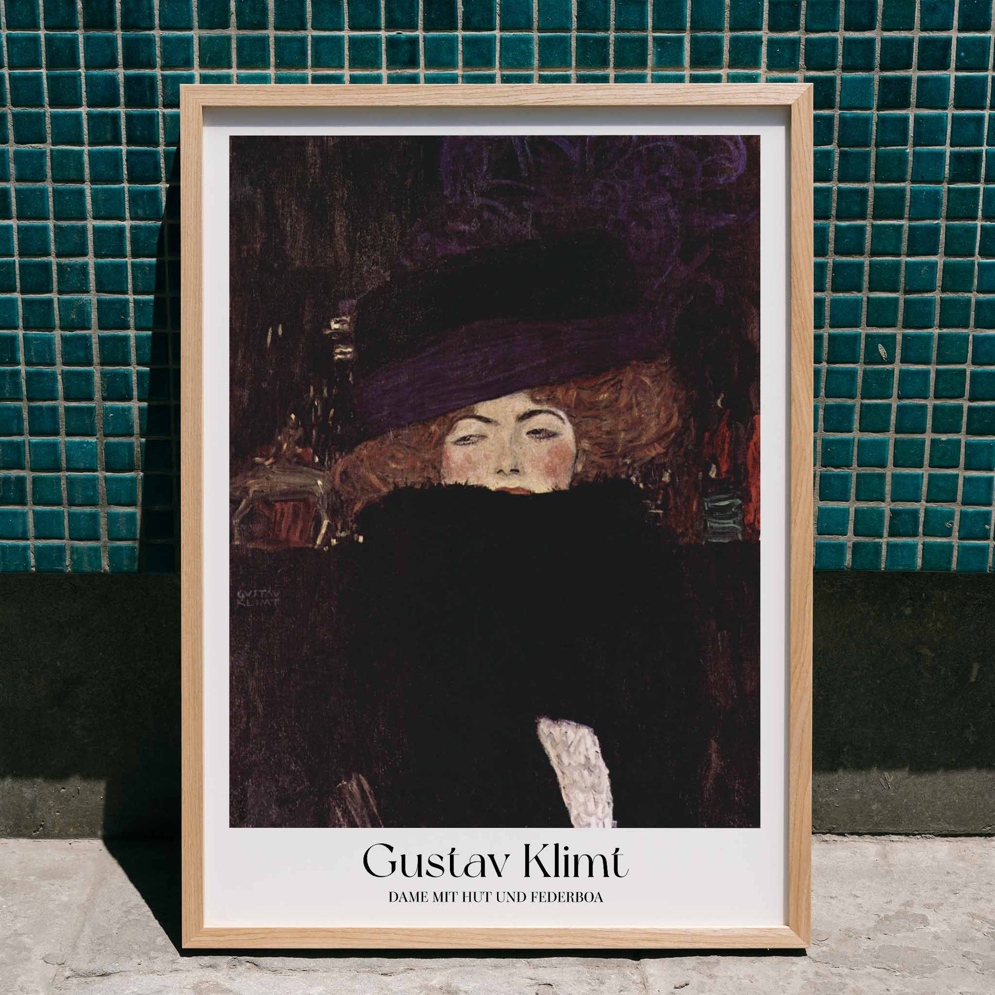 Elegant woman with hat and feather boa painted by Gustav Klimt Dame mit Hut und Federboa poster showing a woman in elegant attire, framed and displayed in home decor