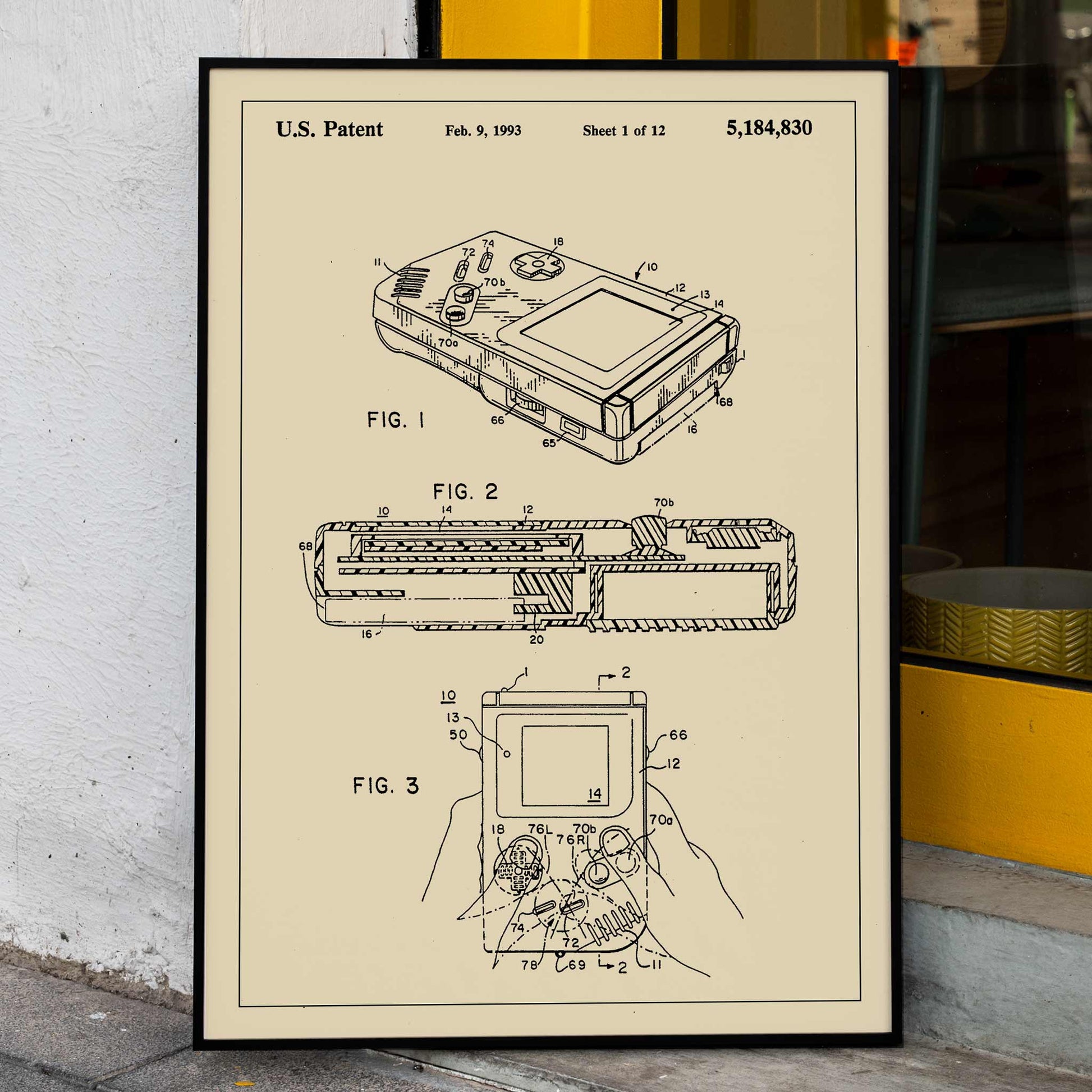 Gameboy Patent technical drawing and poster artwork by Nintendo ideal for gaming decor and collectors, framed and displayed in home decor