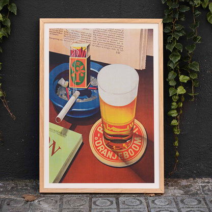 Beer glass on Oranjeboom coaster with cigarette in ashtray and matchbox still life by Bernd Steiner and Anonymous, framed and displayed in home decor