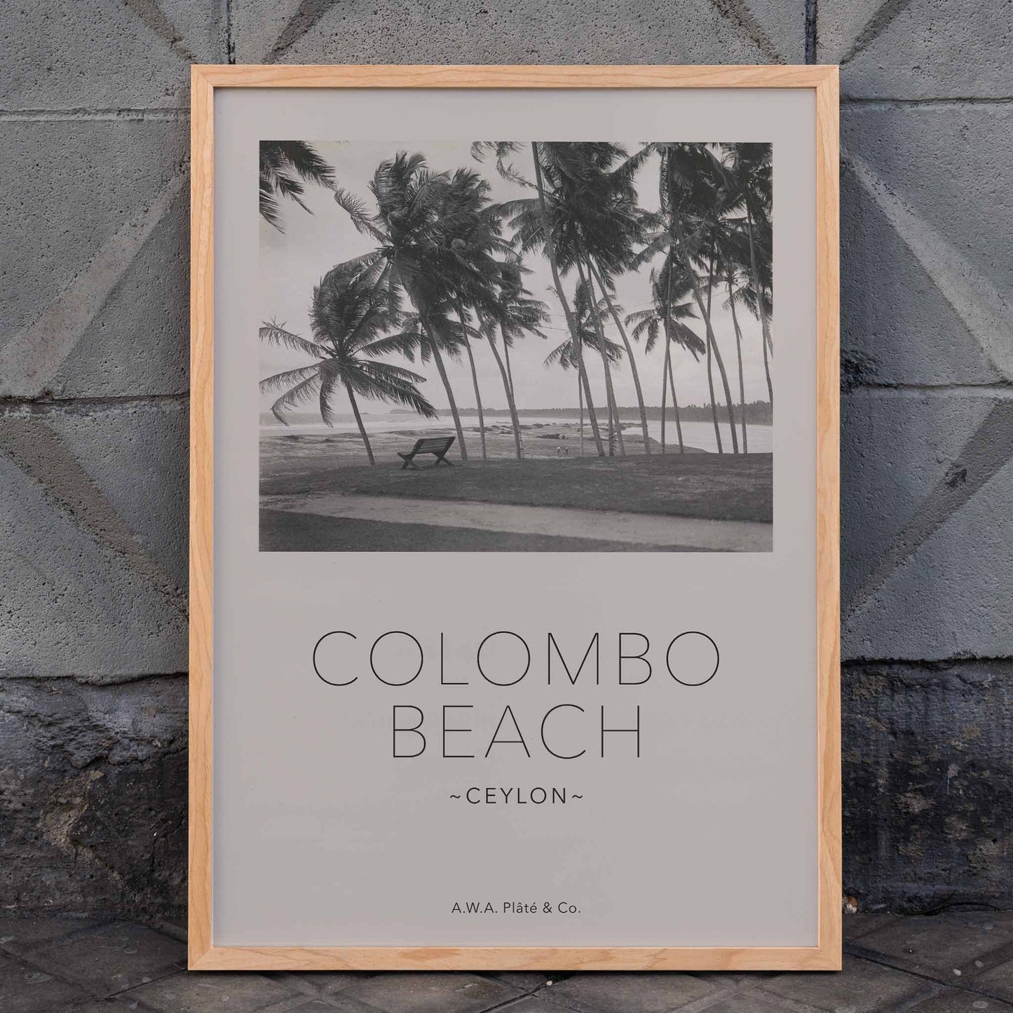 Colombo Beach Ceylon poster with palm trees and empty bench artwork by AWA Plate and Co ideal for wall decor and travel themes, framed and displayed in home decor