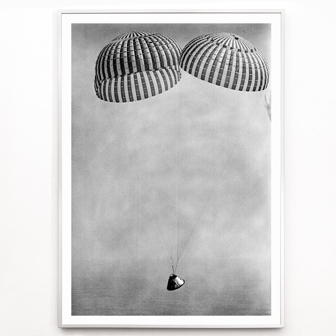 Closeup detail of Apollo 9 spacecraft with astronauts McDivitt Scott and Schweickart descending toward Atlantic splashdown with parachutes NASA recovery poster